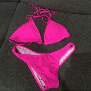 NWT two piece swim suit never worn. Beautiful hot pink